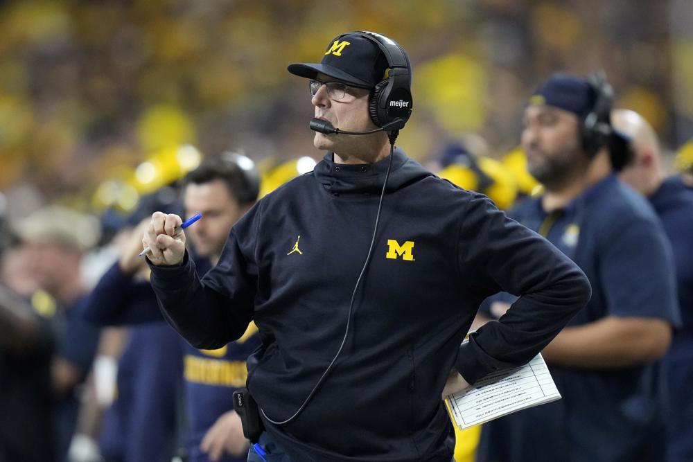 Jim Harbaugh stays in Michigan