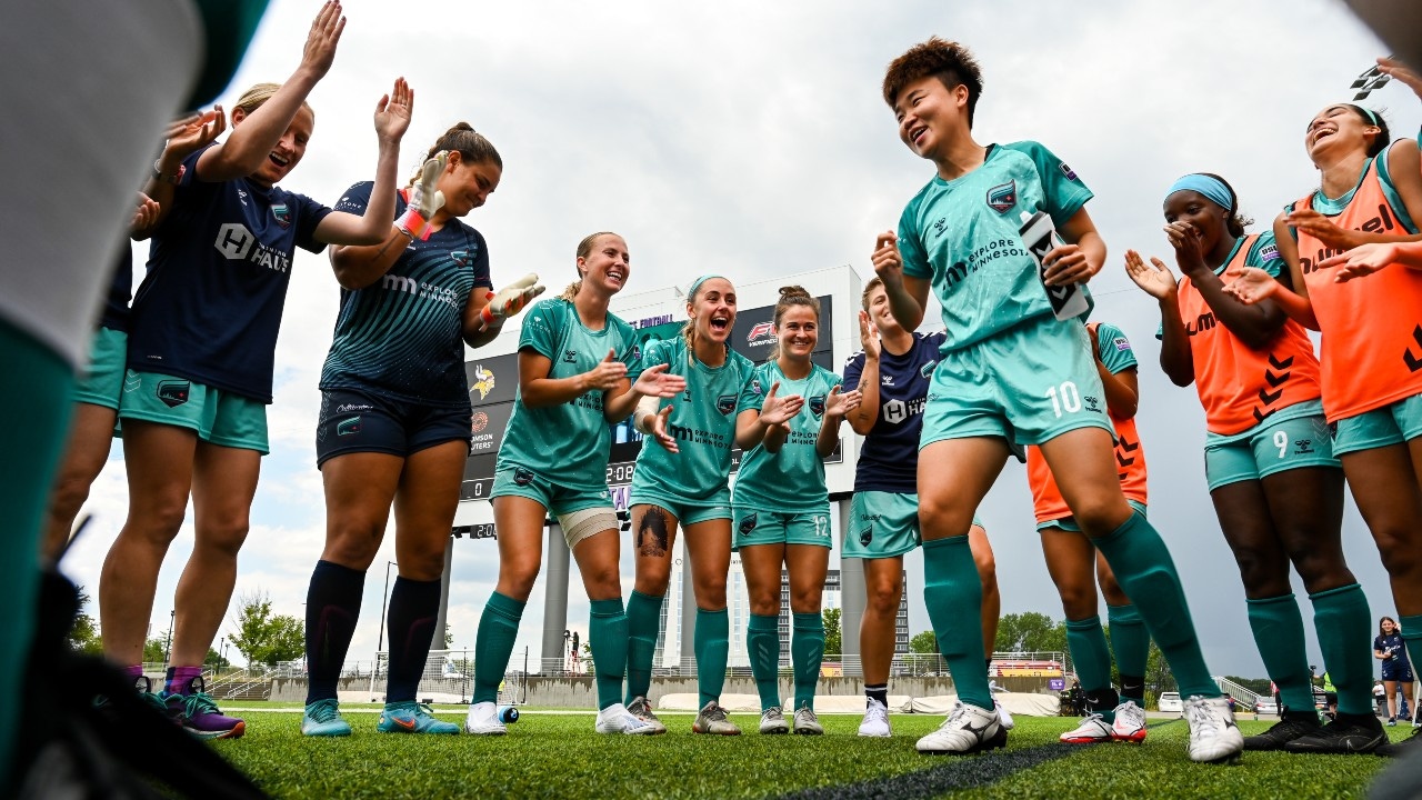 Minnesota Aurora FC midfielder Sangmin Cha rallies her team before a semifinal playoff game with McLean Soccer on Sunday, July 17, 2022, at TCO Stadium in Eagan.