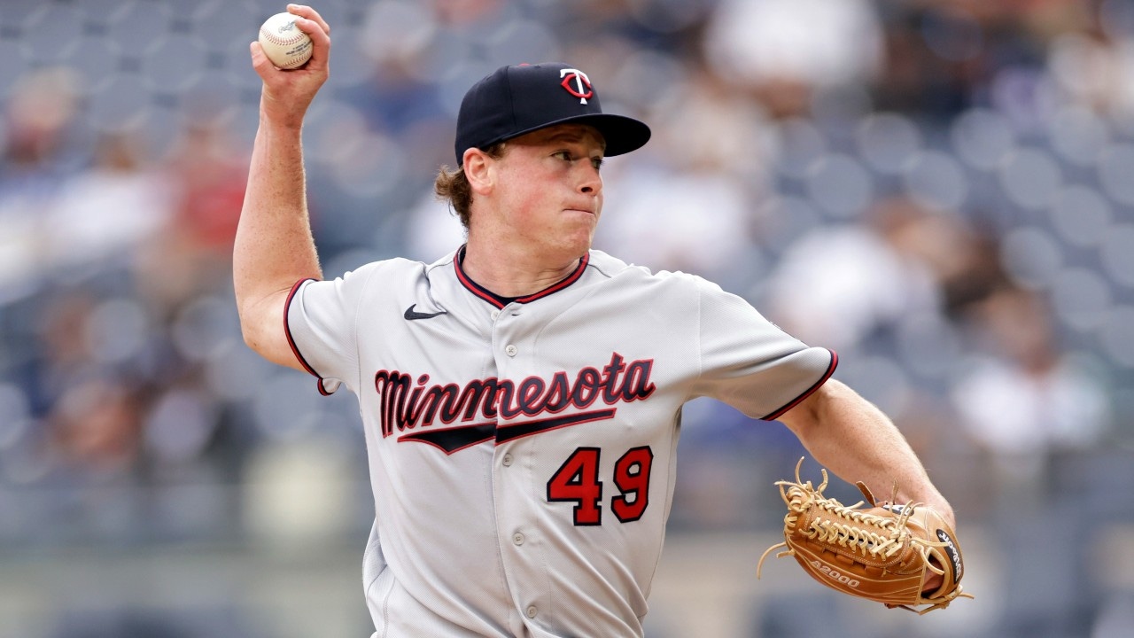 Twins: Jim Rich talks pregame with pitcher Louie Varland 