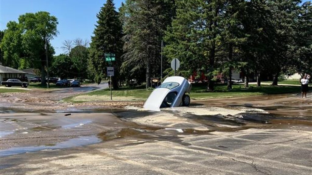 Sinkhole Swallows Car After Water Main Break In Brooklyn Park 5 Eyewitness News