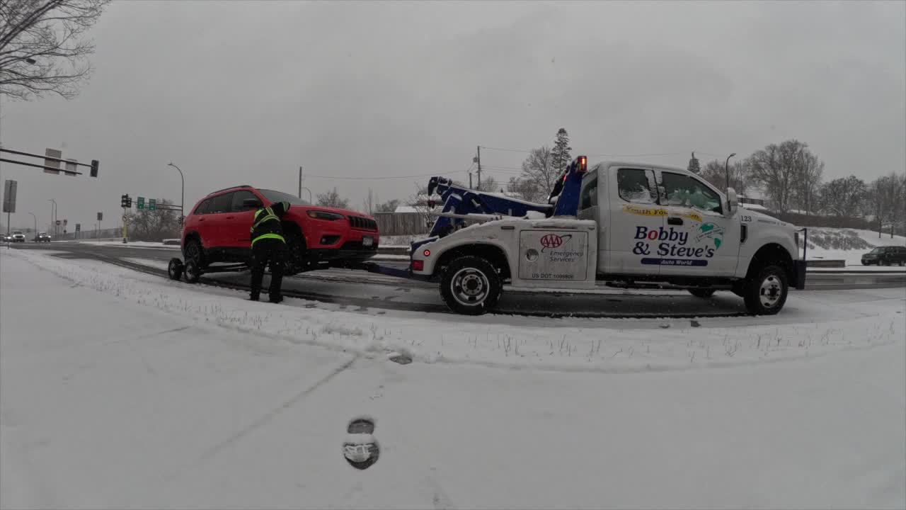 Tow trucks working overtime across Minnesota