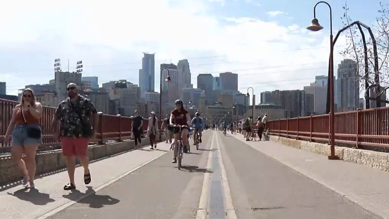 With construction on the Stone Arch Bridge starting Monday, people take their last walk across the complete span this weekend